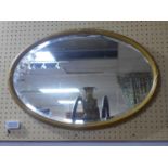 A 19th century oval giltwood mirror, with bevelled glass plate, 53 x 78cm