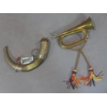 A brass bugle with tassels, L.29cm, together with a copper and horn mounted powder horn, L.34cm (2)