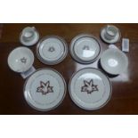 A Royal Doulton 'Playboy Club' breakfast/coffee set, to include 2 dinner plates, 2 tea plates, 2