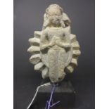 A stone carving of an indian goddess H.25cm