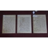 Three ancient manuscript pages of the Koran