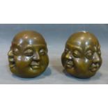Two small bronze head of Maitreya Buddha with happy sad angry and laughing face, 20th century