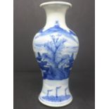 A Chinese baluster vase, blue and white porcelain comprising a scene of an island in a lake with