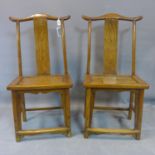 A pair of Chinese Ming elm dining chairs, with yoke and splat back, solid seat, the front legs