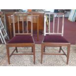 A pair of Edwardian dining chairs