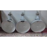 Three Grey Crysteel parabolic industrial pendant lights from Benjamin Electric Manufacturing