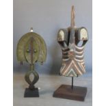 WITHDRAWN - Two African tribal masks to include a Songye mask on stand, H.62cm (mask),