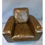 A brown leather armchair, H.80 W.89 D.90cm