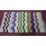 A vintage Moroccan Berber kelim, with multi-coloured wavy design, 290 x 123cm