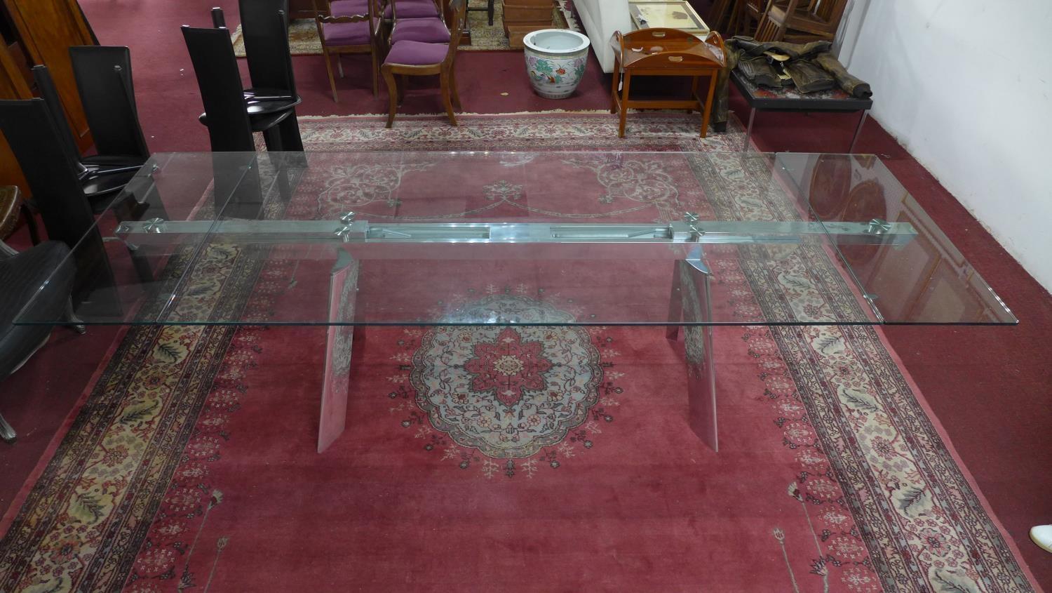 An Italian extending glass dining table by Naos, H.74 W.200 D.100cm (not extended) - Image 3 of 6