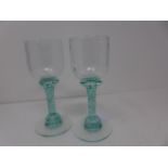 A pair of schnapps glasses designed by Andrew Sanders signed, 21st century, H.22cm