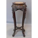 A 19th century mahogany jardiniere stand, with octagonal top with marble to centre within beaded