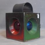 A vintage Railway signal lamp (cracks to two of coloured glass), H.46 W.32 D.32cm