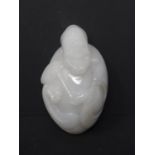A Chinese carved agate pendant in the form of Lohan, H.8.5cm