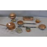 A group of 19th century copper items including a tea urn a tea pot, three pans, a lid, two bad pans,