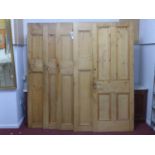 Five stripped pine doors, together with 10 brass door knobs, H.196 W.76cm