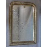 A French Empire mirror with gilt painted and floral carved frame and ghosted glass plate, 100 x 66cm