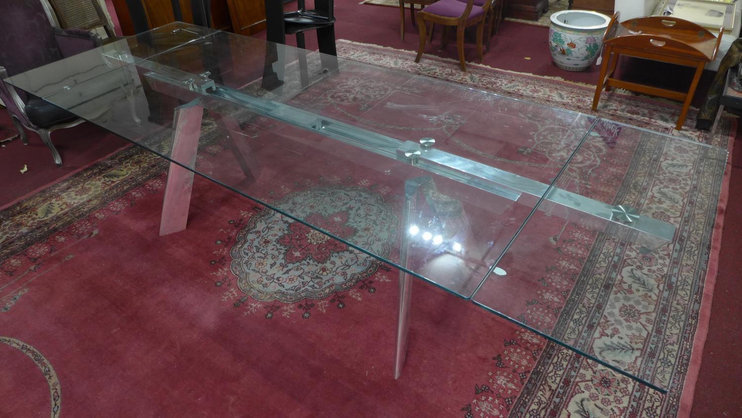 An Italian extending glass dining table by Naos, H.74 W.200 D.100cm (not extended) - Image 6 of 6