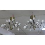 A pair of 12 branch chandeliers by Dar Lighting, with white glass tulip shades and floral stems, H.