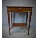 A 20th century mahogany side table, with single drawer above undertier, on tapered legs and spade