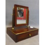 A 19th century French mahogany and brass lined toilet mirror, with rectangular swing mirror above
