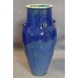 A Persian blue glazed Sharab wine vessel, H.73cm