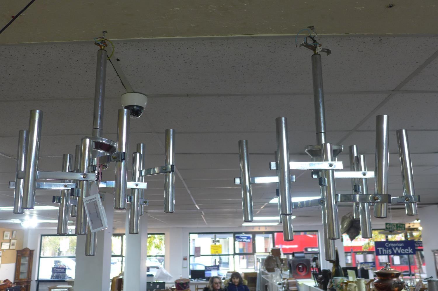 A pair of 1950's/1960's Italian nine light chandeliers, H.60cm Diameter 50cm (2)