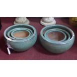 Two sets of three teal glazed planters, H.23cm Diameter 43cm (largest) (6)