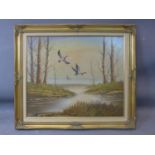 20th century school, ducks flying over water, oil on board, in gilt frame, 50 x 60cm, damage to