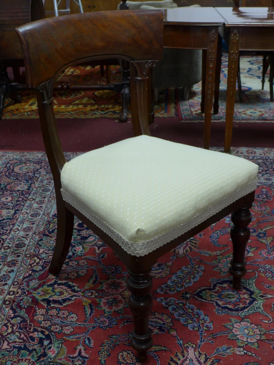 A set of four mahogany William IV dining chairs, with cream upholstered seats, on turned legs, label - Image 3 of 6