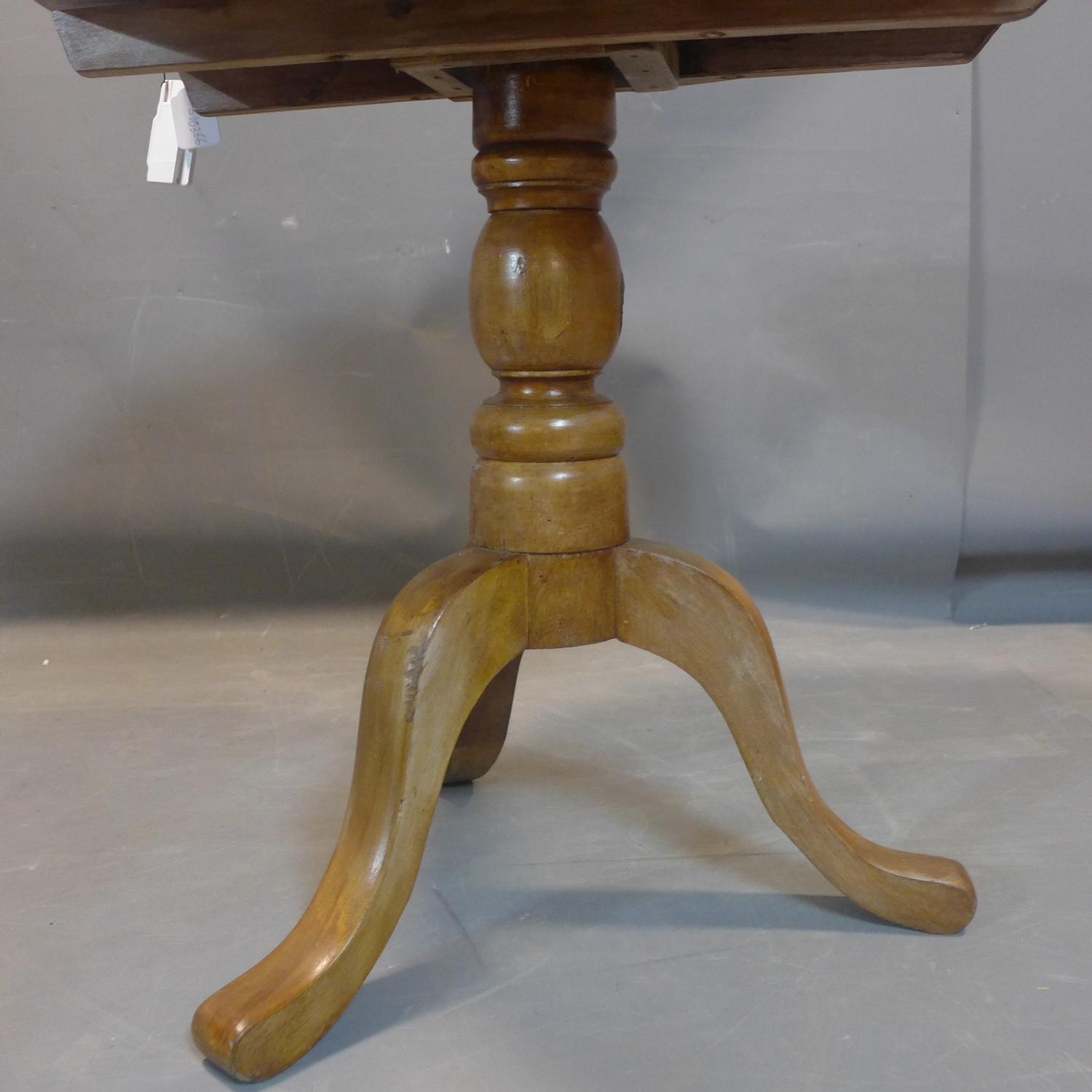 An early 20th century mahogany tilt top occasional table, the circular top on baluster turned - Image 2 of 3