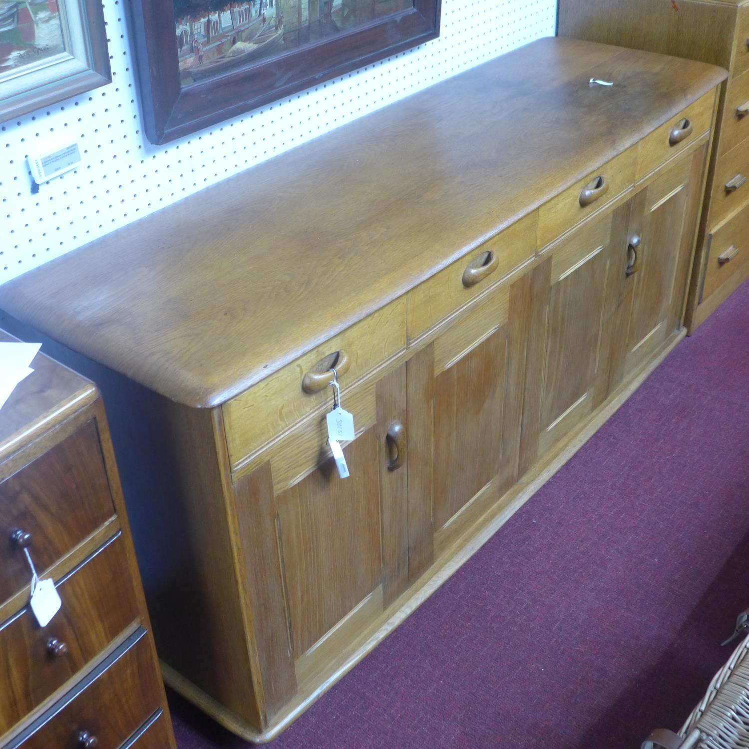 A mid 20th century Ercol teak sideboard, with four short drawers and two pairs of double doors, on - Image 2 of 3