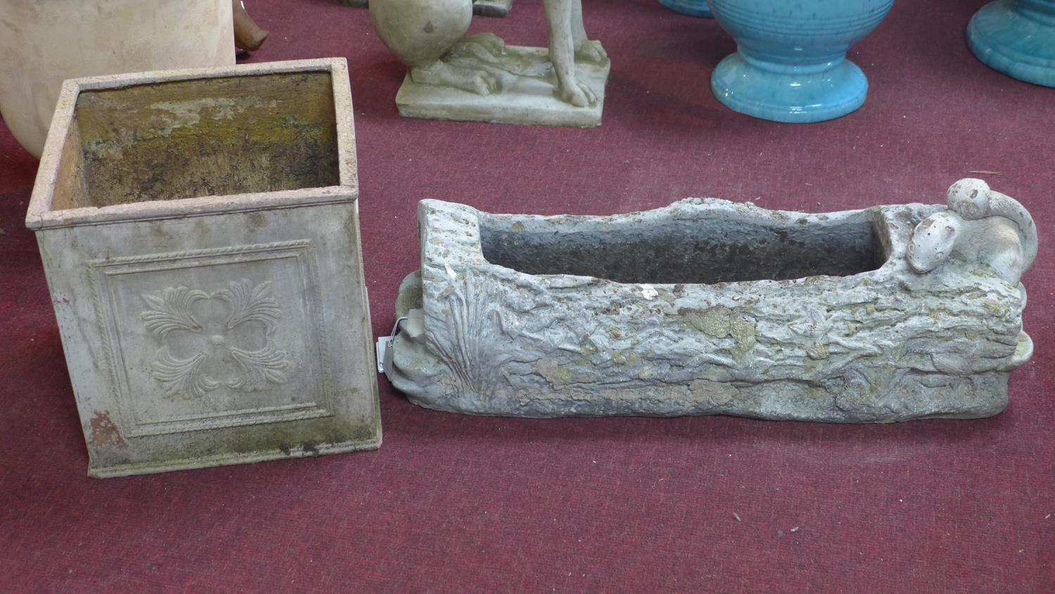 A vintage 'Faux Bois' woodland planter, in the form of a log with a squirrel seated atop, marked '