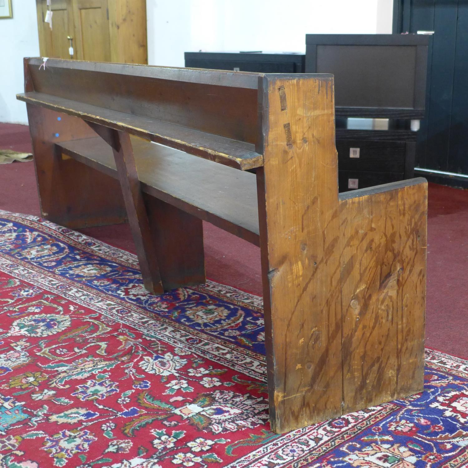 A 20th century pitch pine church pew, H.78 W.204 D.42cm - Image 2 of 3