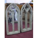 Two reconstituted stone Gothic style arched garden mirrors, 79 x 35cm and 81 x 38cm