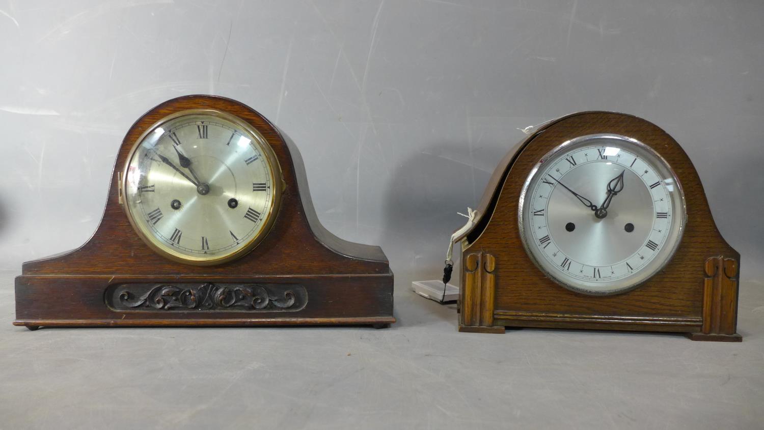 Two 1920's English mantle clocks, both having silvered dials with Roman numerals, 8 day movements,