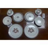A Royal Doulton 'Playboy Club' breakfast/coffee set, to include 2 dinner plates, 2 tea plates, 2