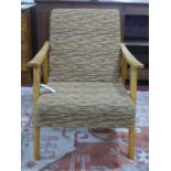 A retro armchair with striped orange upholstery, H. 80 x W. 60 x D. 65 cm