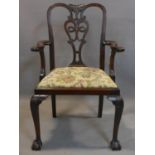 19th century mahogany Chippendale style hallway armchair, with drop-in seat and scroll arms,
