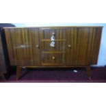 A 20th century walnut Cumbrae by Morris of Glasgow sideboard, with maker's mark, having three