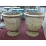 Two large terracotta Provence urn style planters, H.68cm Diameter 60cm