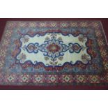 A central persian Najafabad Carpet 326cm x 218cm , cenral double pendant medallion on ivory field