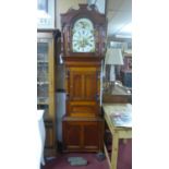 A Victorian mahogany longcase clock, twin train movement, striking bell, with swan neck pediment