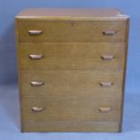 An oak secretaire chest of drawers, with fitted secretaire having fitted interior above three long