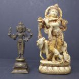 A bronze statue of Hindu deity Brahma, H.16cm, together with a moulded statue of Krishna, H.21cm
