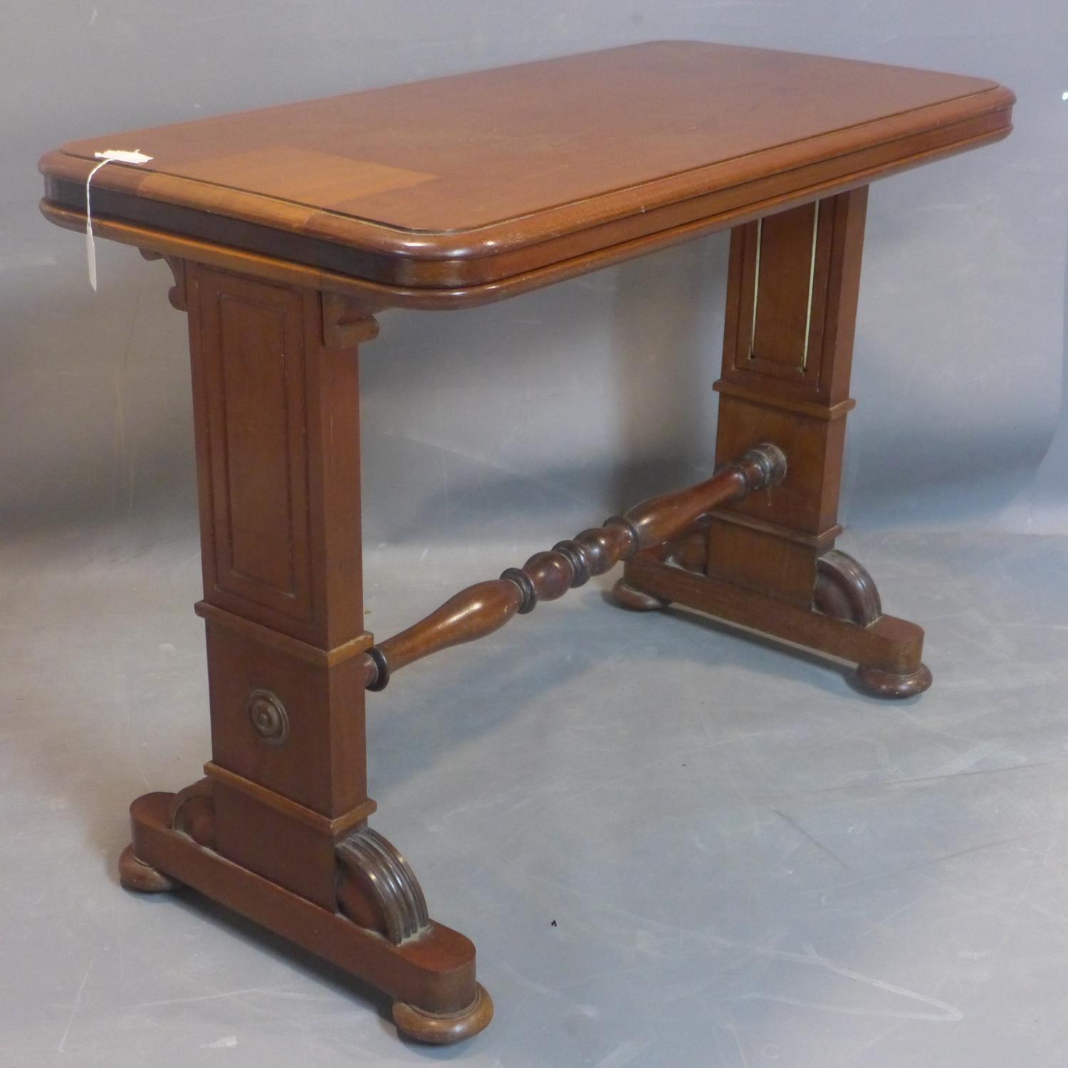 A 19th century mahogany three tier metamorphic buffet, on carved supports joined by turned