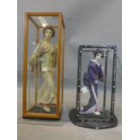 Two Japanese dolls, one holding a samisen, in mother of pearl inlaid display case, H.27.5cm (