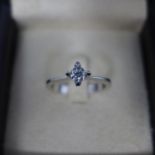 An 18ct white gold and round brilliant cut diamond solitaire ring, approx. 0.35cts, marked 750, size