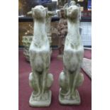 Two reconstituted stone seated greyhounds, on square bases, H.76cm
