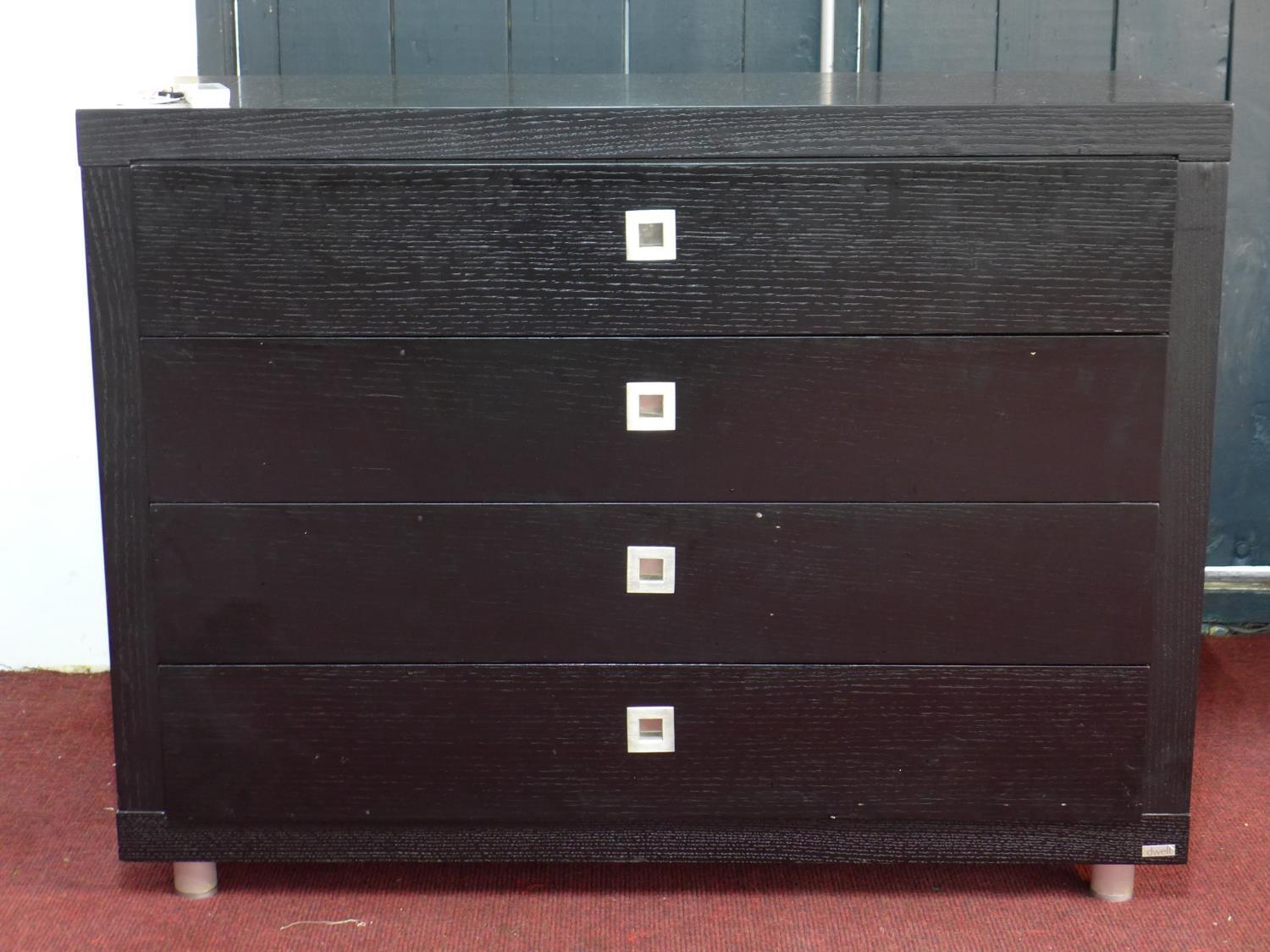 A Dwell stained oak chest of 4 drawers, H.75 W.100 D.43cm